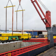 project cargo lift from rails to a charter vessel by using the vessel's crane at Hamina port in Finland