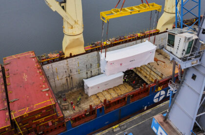 Breakbulk project cargo loading with spreader into the vessel for marine transport