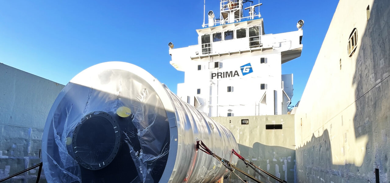 Oversized industrial cargo secured on vessel deck for project logistics transport by sea