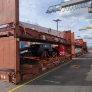 Project cargo loaded into flat rack containers at the Port of Helsinki, demonstrating secure stowage and handling of heavy industrial equipment.