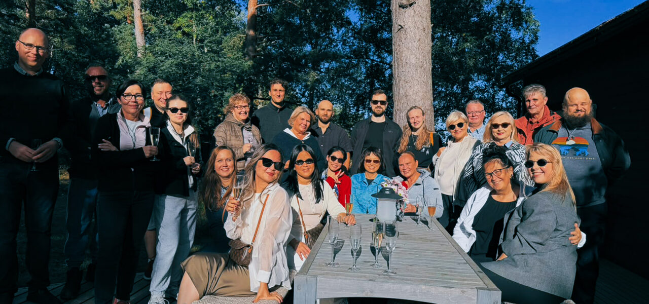 Hacklin Logistics employees gathering during an annual wellbeing day in Finland, celebrating teamwork, collaboration, and company culture.