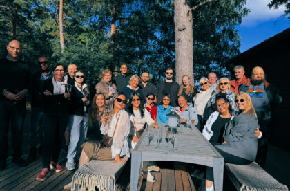 Hacklin Logistics employees gathering during an annual wellbeing day in Finland, celebrating teamwork, collaboration, and company culture.